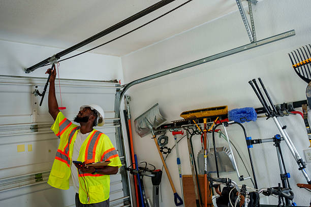 Professional Garage Door Roller Replacement technician working in Lamont, MI